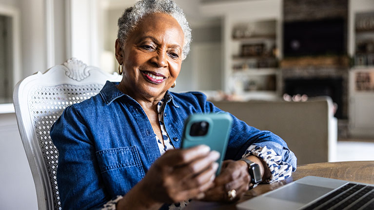 Woman relaxing looking a her health app