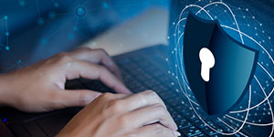 security shield for a person typing on a computer