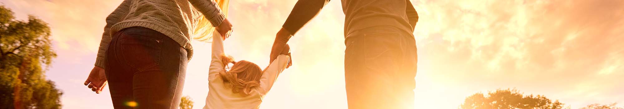 Family walking hand in hand
