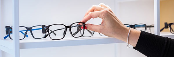 Person looking at a new frames for glasses