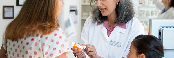 Pharmacist talking about medication 