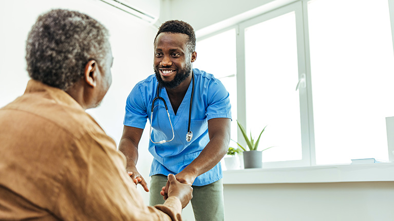 Nurse talking with an elderly person