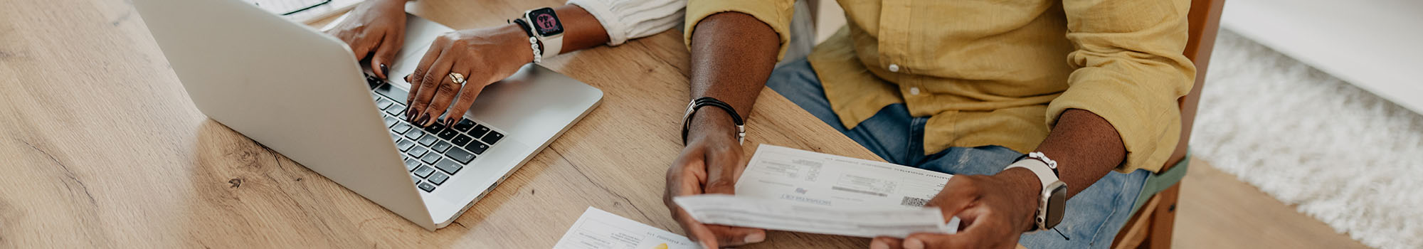 Couple working together at a laptop