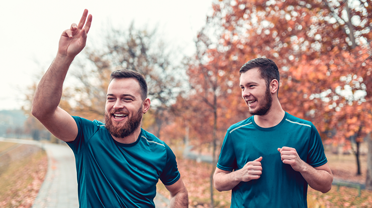 Male Athletes Enjoying A Run Of Peace