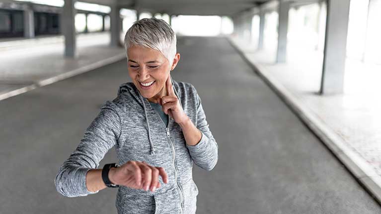Woman checking pulse
